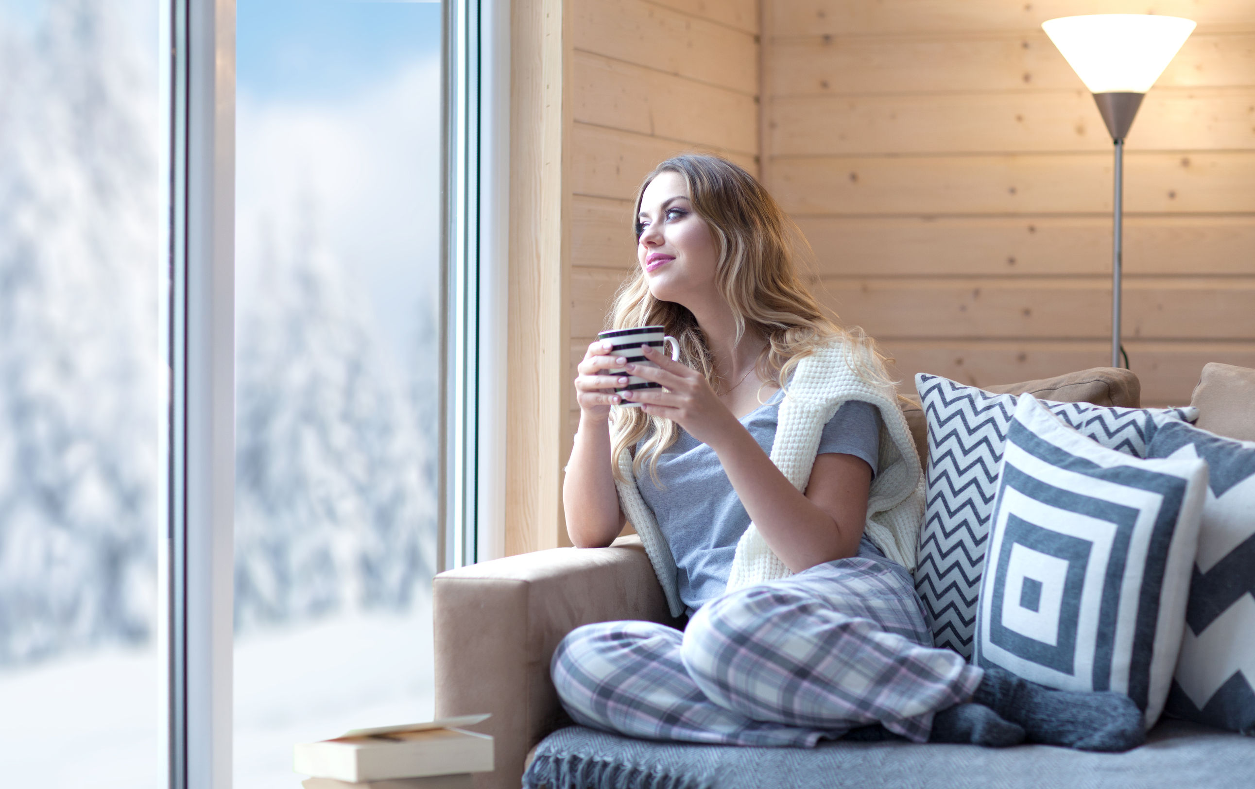 Homeowner enjoying winter in heated home